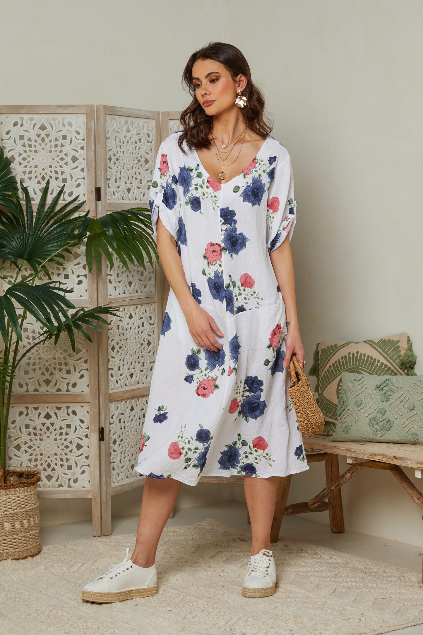 Robe fleurie à manches courtes avec poches
