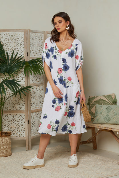Robe fleurie à manches courtes avec poches