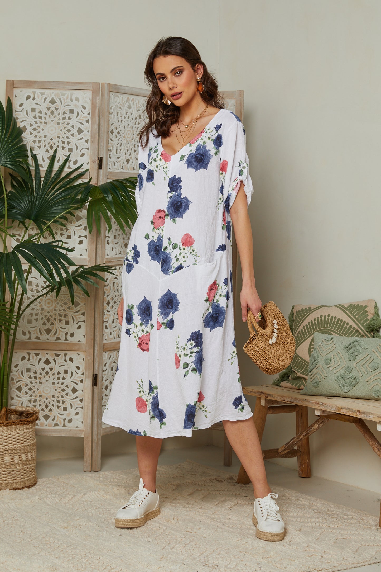 Robe fleurie à manches courtes avec poches
