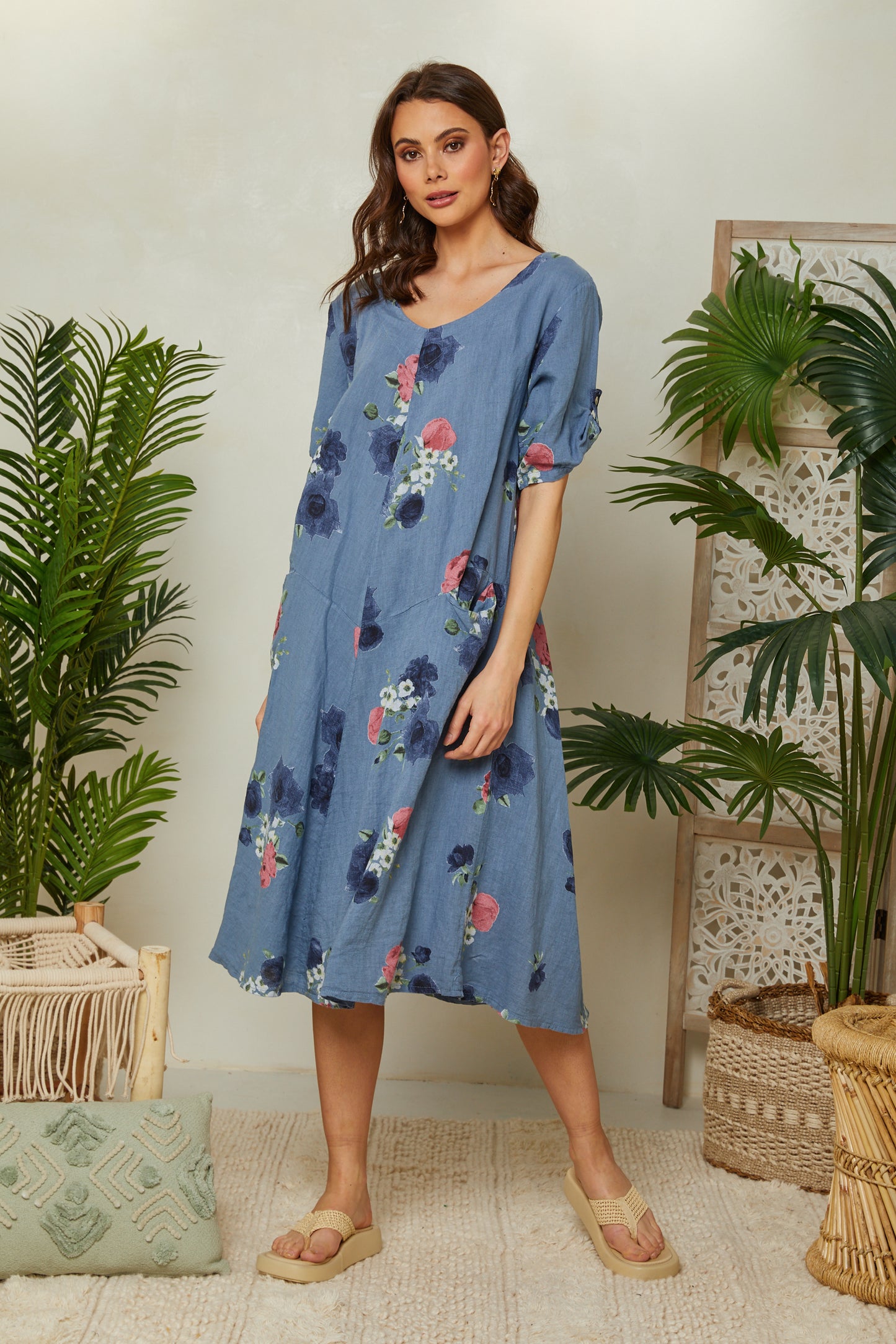 Robe fleurie à manches courtes avec poches