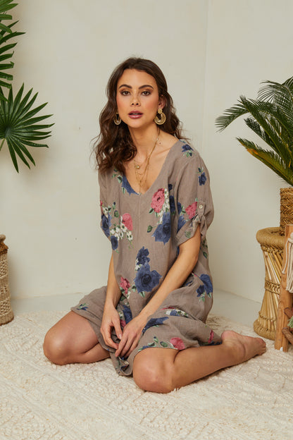 Robe fleurie à manches courtes avec poches
