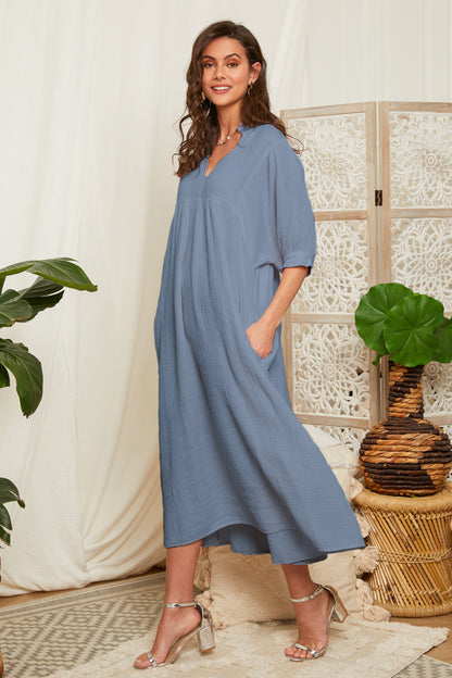 Robe longue avec poches latérales